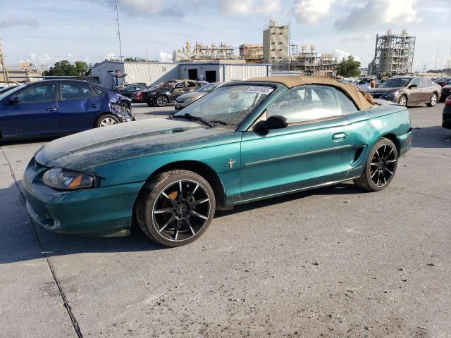 1FALP4444VF112775 - 1997 FORD MUSTANG GREEN photo 1