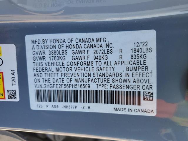 2HGFE2F56PH516509 - 2023 HONDA CIVIC SPORT BLUE photo 12