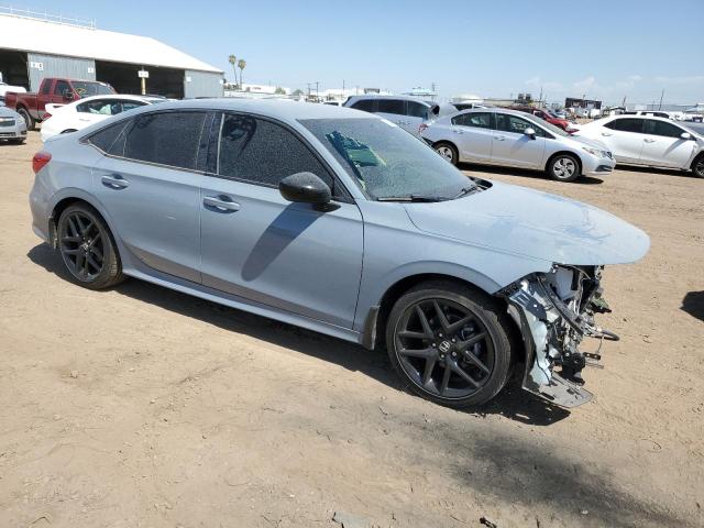 2HGFE2F56PH516509 - 2023 HONDA CIVIC SPORT BLUE photo 4