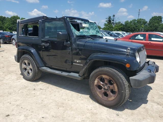1C4AJWBG2GL128652 - 2016 JEEP WRANGLER SAHARA Negro foto 4