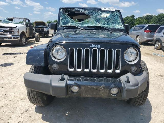 1C4AJWBG2GL128652 - 2016 JEEP WRANGLER SAHARA Negro foto 5