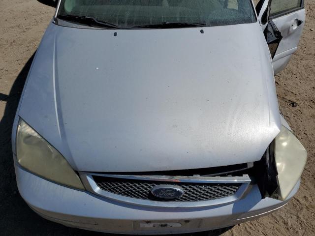 1FAFP34N77W325450 - 2007 FORD FOCUS ZX4 SILVER photo 11