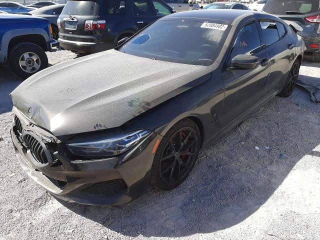 WBAGV8C04LBP48797 - 2020 BMW M850XI BLACK photo 2