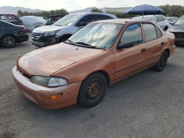 1Y1SK5267VZ415557 - 1997 GEO PRIZM BASE ORANGE photo 1