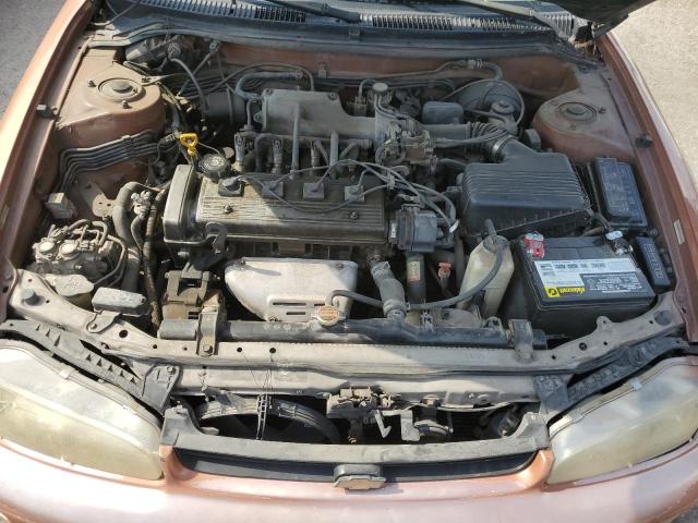 1Y1SK5267VZ415557 - 1997 GEO PRIZM BASE ORANGE photo 11