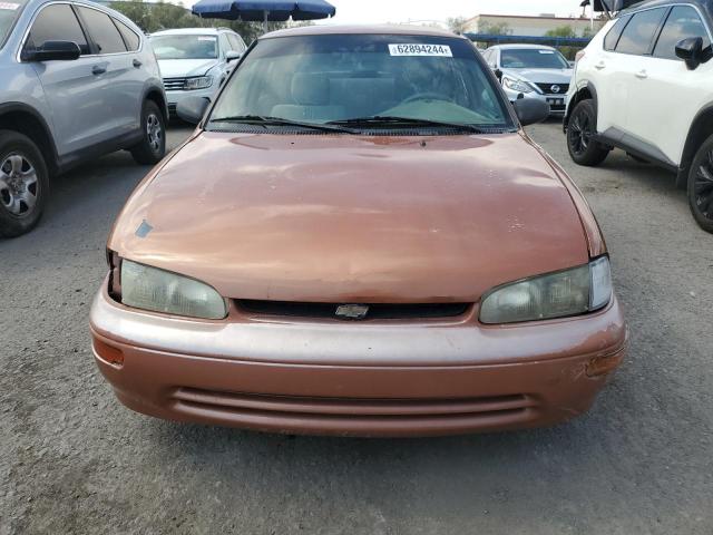1Y1SK5267VZ415557 - 1997 GEO PRIZM BASE ORANGE photo 5