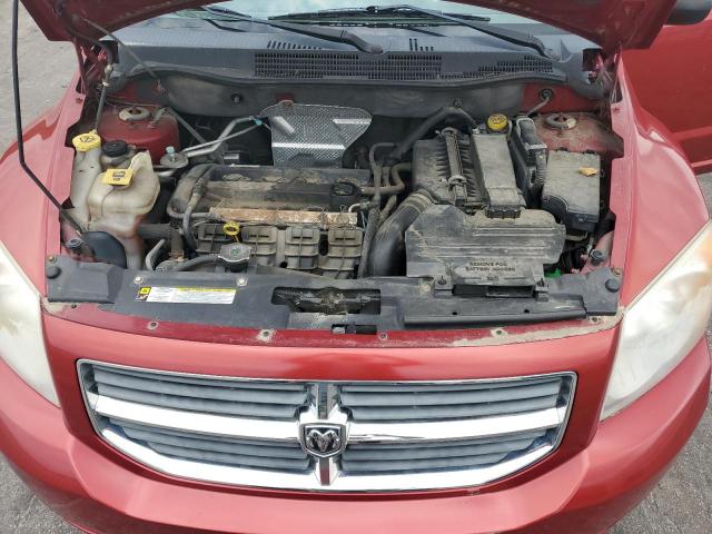 1B3CB3HAXAD615558 - 2010 DODGE CALIBER MAINSTREET RED photo 11