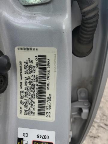 1NXBU4EE1AZ170821 - 2010 TOYOTA COROLLA BASE SILVER photo 12