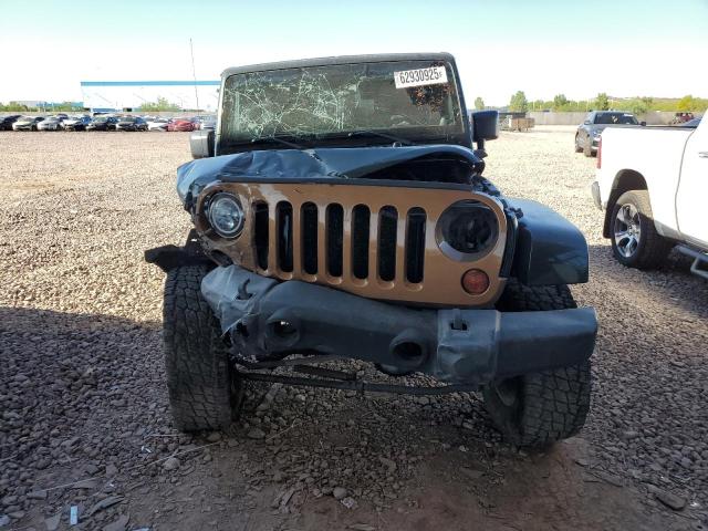 1J4HA5H17BL578277 - 2011 JEEP WRANGLER U SAHARA GREEN photo 5
