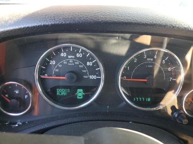 1J4HA5H17BL578277 - 2011 JEEP WRANGLER U SAHARA GREEN photo 9