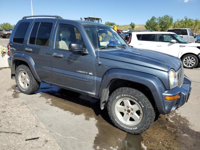 1J8GL58K72W223489 - 2002 JEEP LIBERTY LIMITED BLUE photo 4