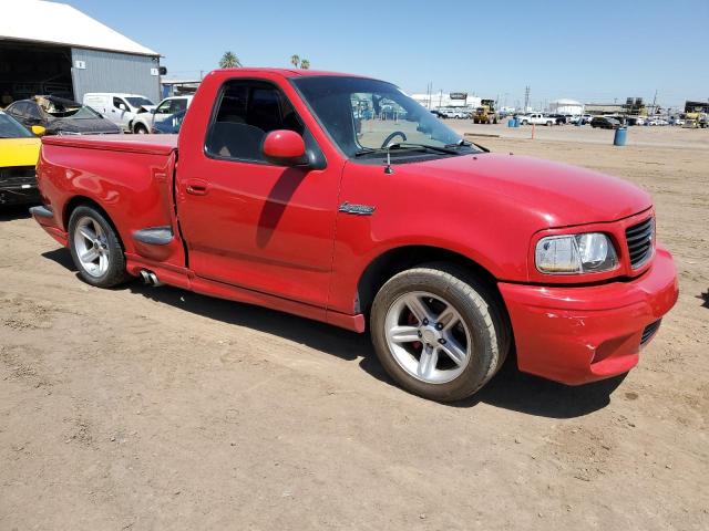 2FTZF0737YCA72243 - 2000 FORD F150 SVT LIGHTNING RED photo 4