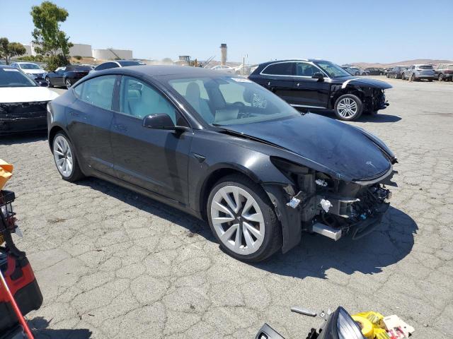5YJ3E1EA5NF303032 - 2022 TESLA MODEL 3 შავი ფოტო 4