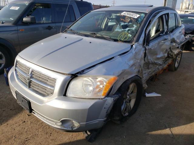 1B3CB3HA9BD242465 - 2011 DODGE CALIBER MAINSTREET SILVER photo 2