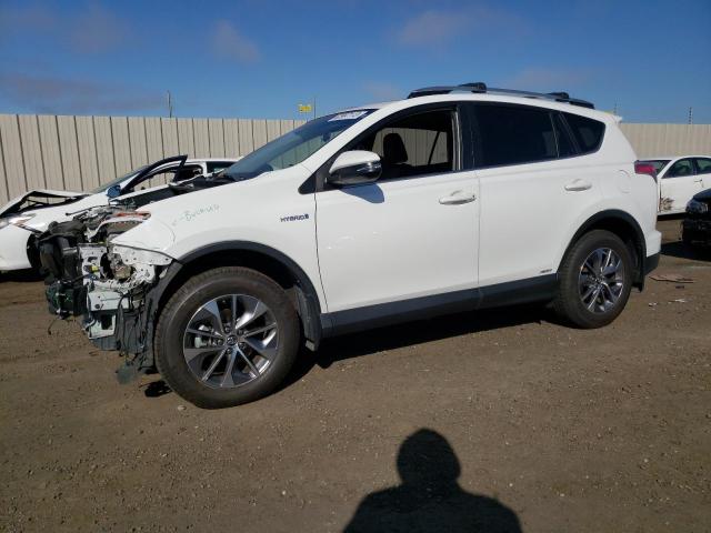 JTMRJREV6HD100119 - 2017 TOYOTA RAV4 HV LE WHITE photo 1