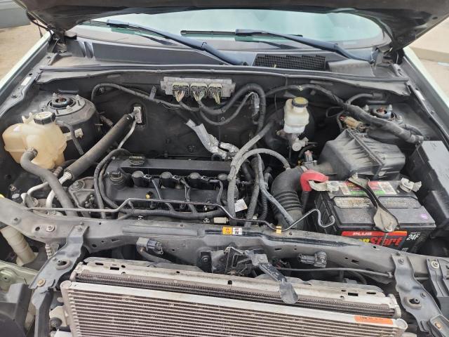 4M2CU81749KJ17782 - 2009 MERCURY MARINER GREEN photo 11