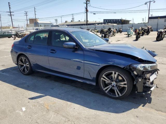 3MW69FF08P8D22148 - 2023 BMW 330I BLUE photo 4