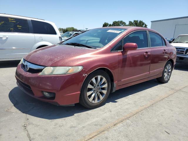 19XFA1F69BE001599 - 2011 HONDA CIVIC LX-S Tünd qırmızı foto 1