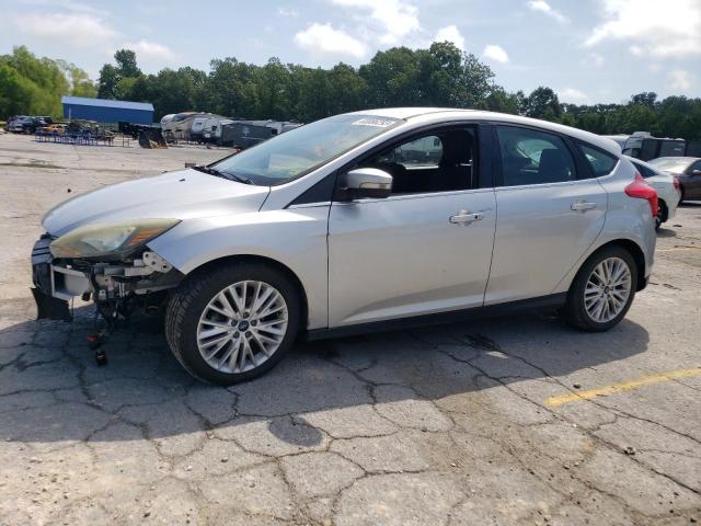 1FAHP3N29CL166729 - 2012 FORD FOCUS TITANIUM SILVER photo 1