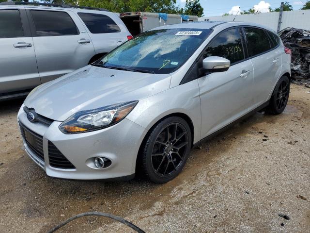 1FAHP3N26CL347481 - 2012 FORD FOCUS TITANIUM SILVER photo 1