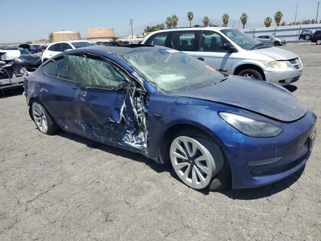 5YJ3E1EA5NF250235 - 2022 TESLA MODEL 3 ლურჯი ფოტო 4