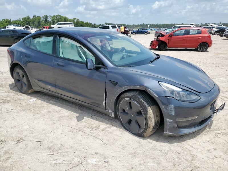 5YJ3E1EA0PF630151 - 2023 TESLA MODEL 3 GRAY photo 4