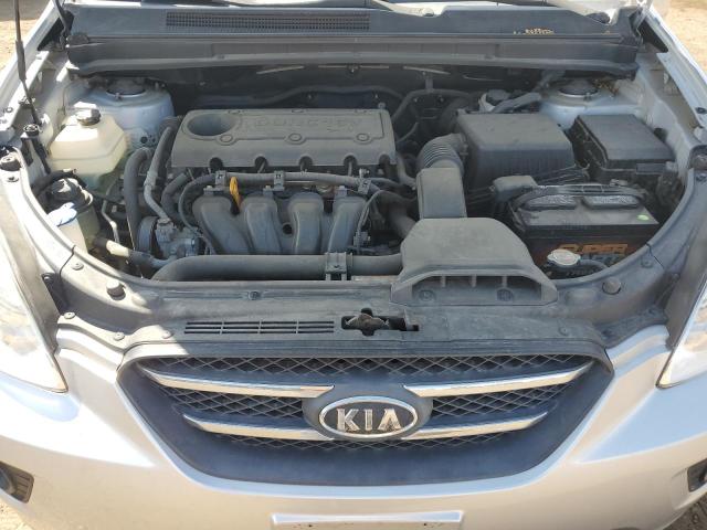 KNAFG528197238673 - 2009 KIA RONDO BASE SILVER photo 12