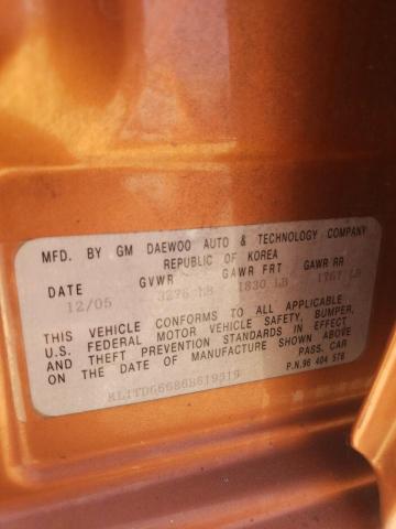 KL1TD66686B619319 - 2006 CHEVROLET AVEO BASE ORANGE photo 12