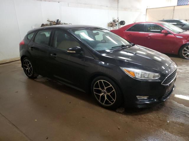 1FADP3K23FL251167 - 2015 FORD FOCUS SE BLACK photo 4