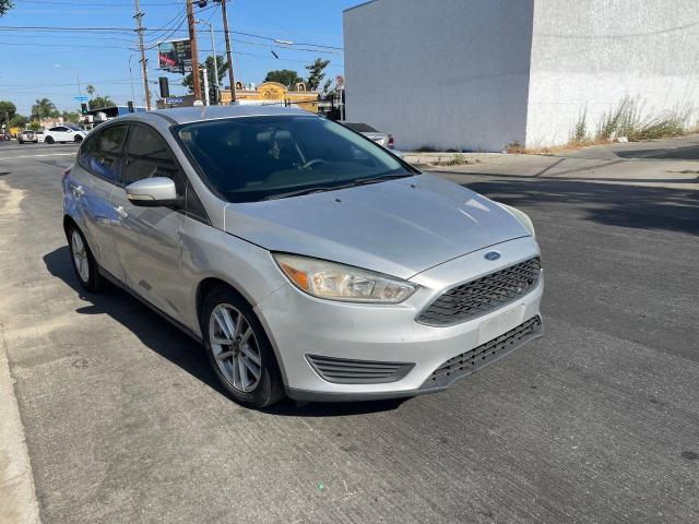 1FADP3K23HL284852 - 2017 FORD FOCUS SE SILVER photo 1