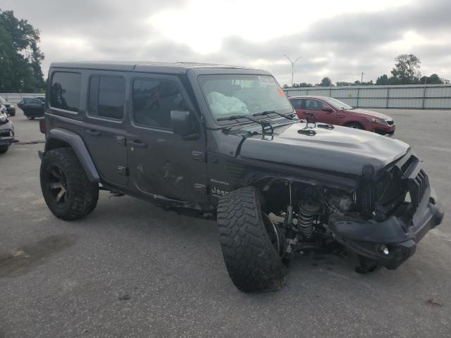 1C4HJXEN7JW325076 - 2018 JEEP WRANGLER U SAHARA Grau Foto 4