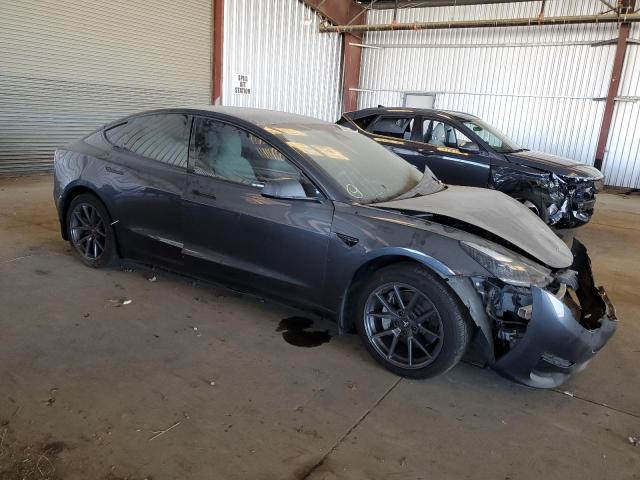 5YJ3E1EA9PF623599 - 2023 TESLA MODEL 3 GRAY photo 4
