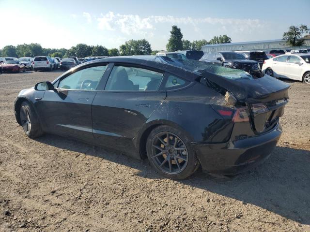 5YJ3E1EA0PF555404 - 2023 TESLA MODEL 3 შავი ფოტო 2