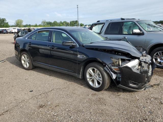 1FAHP2E82HG106208 - 2017 FORD TAURUS SEL BLACK photo 4