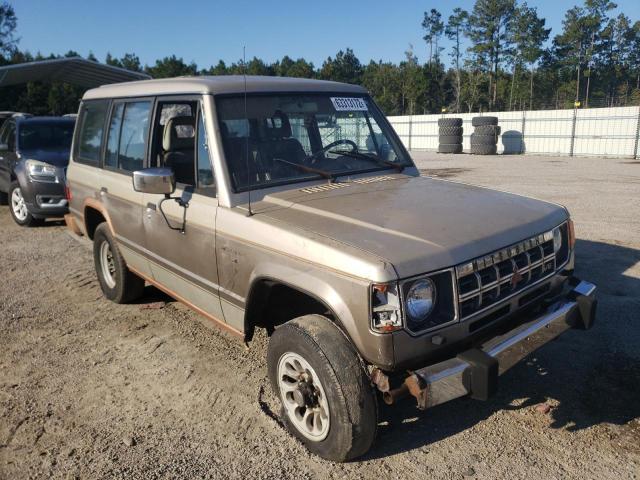 JA4GJ51S3MJ002716 - 1991 MITSUBISHI MONTERO LS TAN photo 9