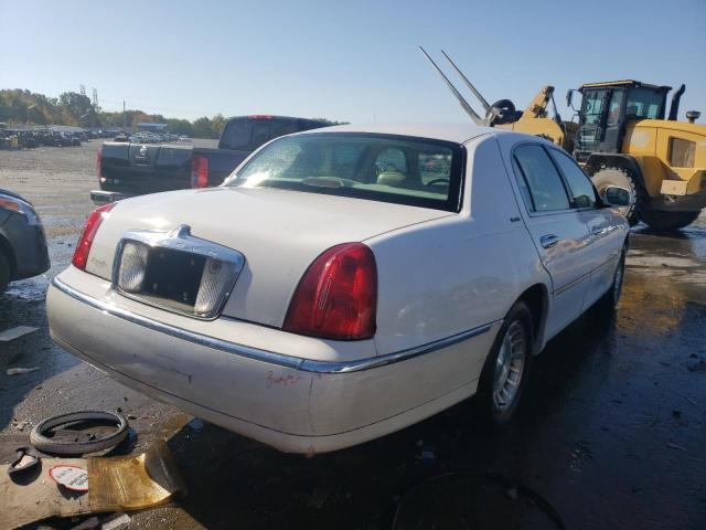 1LNHM81W1XY638290 - 1999 LINCOLN TOWN CAR EXECUTIVE WHITE photo 4