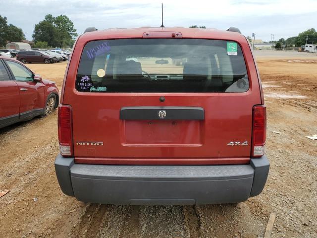 1D8GU28K77W555444 - 2007 DODGE NITRO SXT RED photo 6