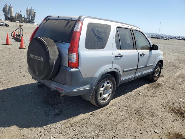 JHLRD68555C002043 - 2005 HONDA CR-V LX SILVER photo 3