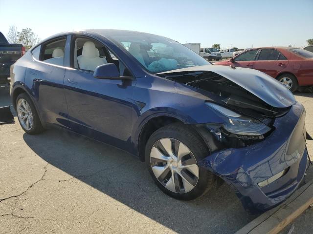 7SAYGDEE9RA227373 - 2024 TESLA MODEL Y BLUE photo 4