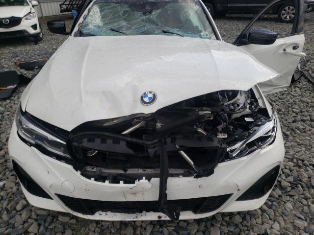 3MW5U9J04M8B57357 - 2021 BMW M340XI WHITE photo 11