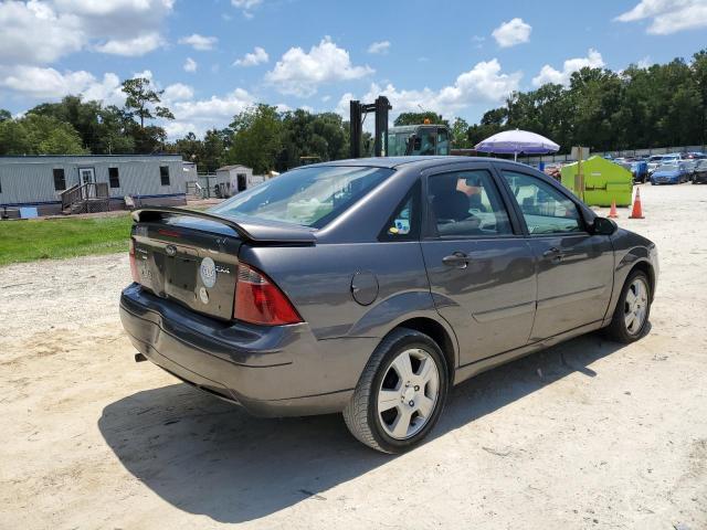 1FAFP34N95W311983 - 2005 FORD FOCUS ZX4 GRAY photo 3