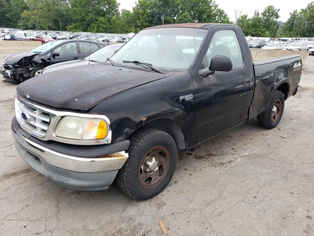 2FTZF1729XCB23110 - 1999 FORD F-150 BLACK photo 1