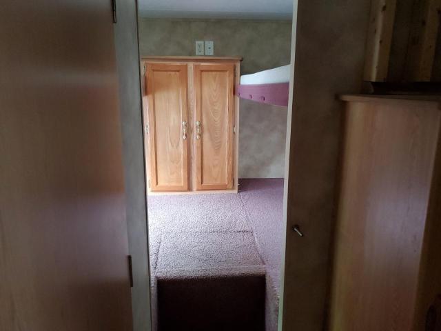 4YDT31B205E313467 - 2005 KEYSTONE HORNET TWO TONE photo 6