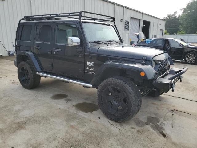 1C4HJWEG5EL137577 - 2014 JEEP WRANGLER U SAHARA შავი ფოტო 4