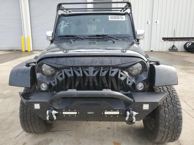 1C4HJWEG5EL137577 - 2014 JEEP WRANGLER U SAHARA შავი ფოტო 5