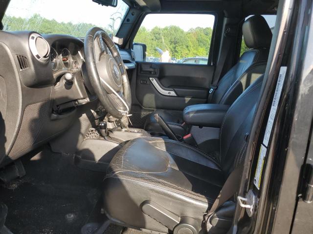 1C4HJWEG5EL137577 - 2014 JEEP WRANGLER U SAHARA შავი ფოტო 7