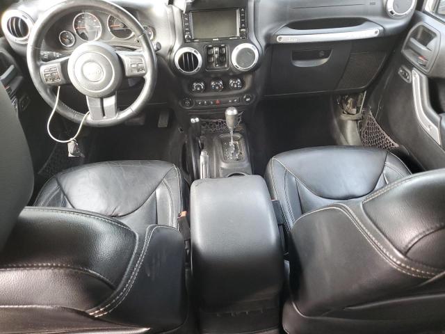 1C4HJWEG5EL137577 - 2014 JEEP WRANGLER U SAHARA შავი ფოტო 8