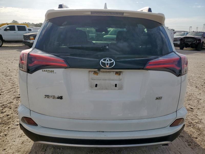 JTMNFREV0JJ164230 - 2018 TOYOTA RAV4 SE WHITE photo 6