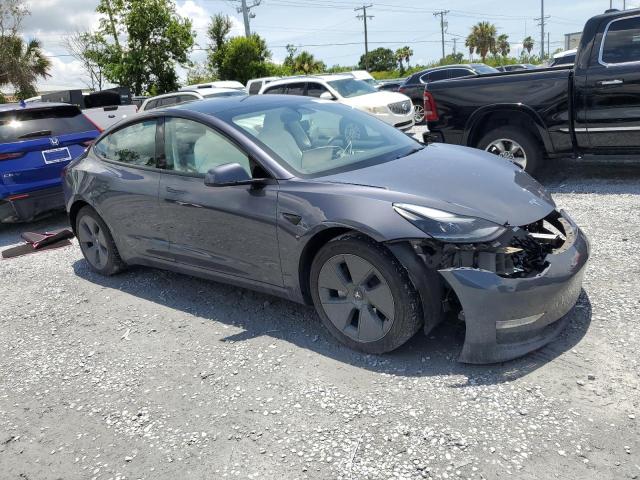 5YJ3E1EA3PF646344 - 2023 TESLA MODEL 3 GRAY photo 4