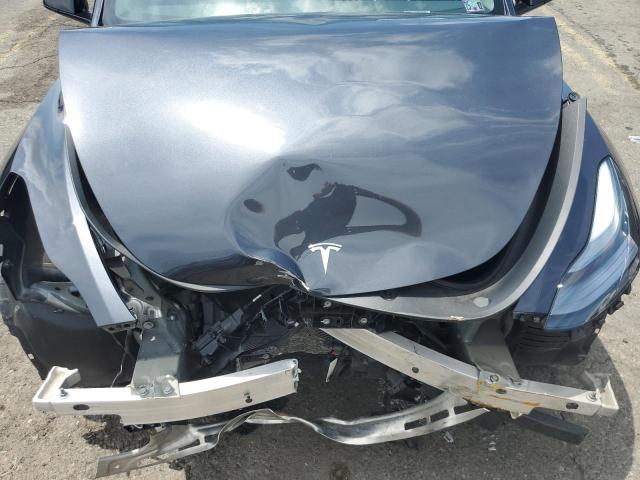 7SAYGAEE2SF222975 - 2025 TESLA MODEL Y CHARCOAL photo 11